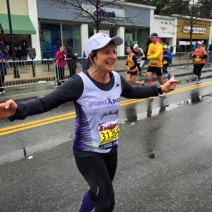 Tammy mid-way through the Boston Marathon
