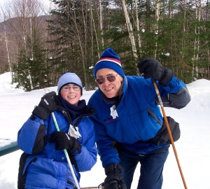A young Elizabeth skiing with her father, John