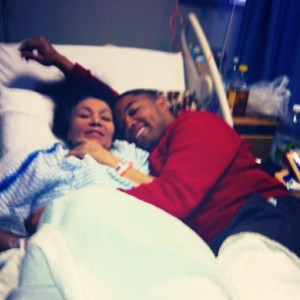 Joel with his mother Mera, in her hospital bed.