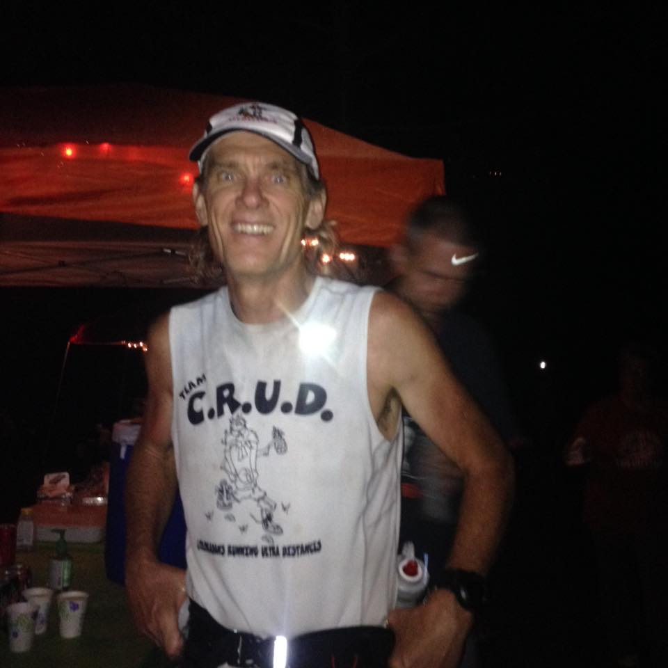 Larry DeWitt taking a moment at an aid station during the Burning River 100 mile race. 