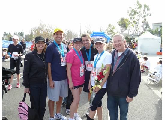 Christine with her family at a previous half-marathon.