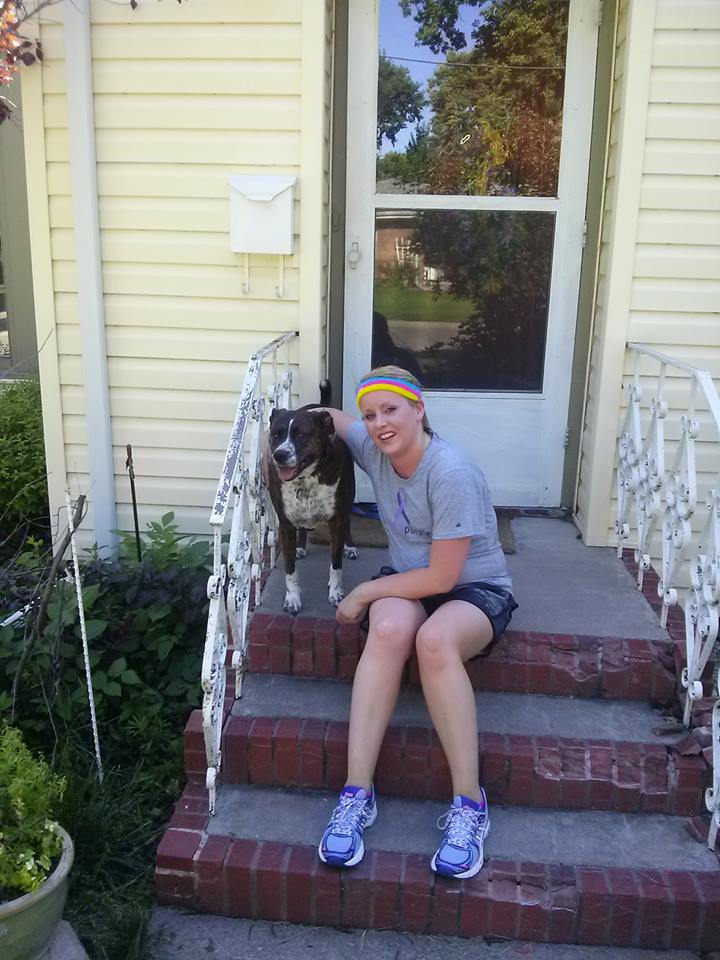 Jody with her therapy dog, Willis, after they put in some miles for Gary together.