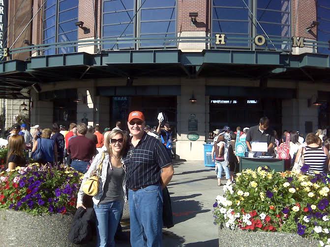 Maddy and Terry outside of a MLB Field.