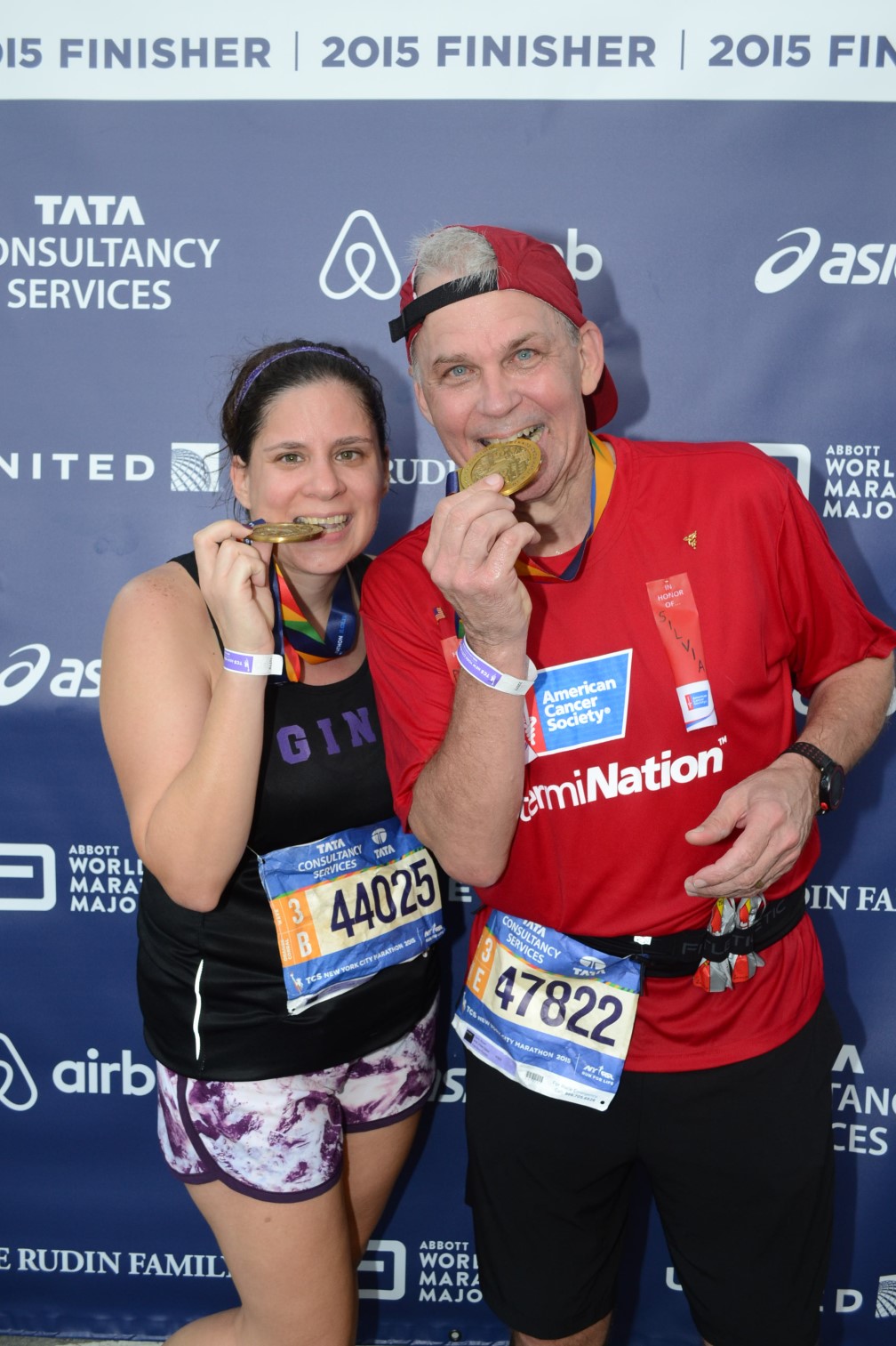 Gina Alvarez and Bob Davis after finishing the New York City Marathon